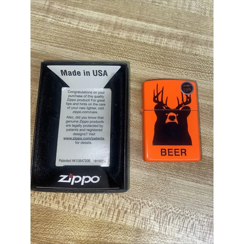 New In Box Zippo Lighter Beer (Bear With Deer Antlers) Orange & Black